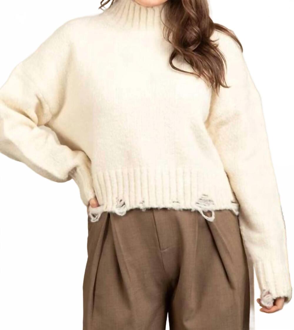 NEW FASHION DISTRICT LA long sleeve mock neck distressed sweater in cream
